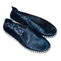 These are Skechers Sepulveda Blvd slip-on espadrilles featuring a black leather upper and a memory foam insole, letsell.pk