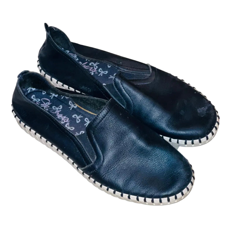 These are Skechers Sepulveda Blvd slip-on espadrilles featuring a black leather upper and a memory foam insole, letsell.pk