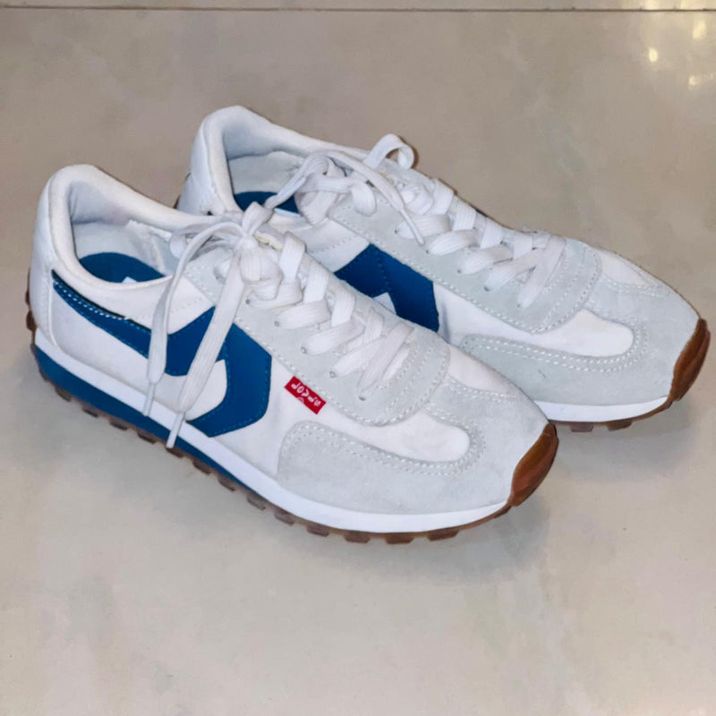 Levi's Stryder Red Tab sneakers in white and navy retro inspired design