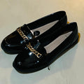 New Look Wide Fit Black Patent Chain Loafers with a gold tone metallic chain detail