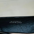 New Look Wide Fit Black Patent Chain Loafers with a gold tone metallic chain detail